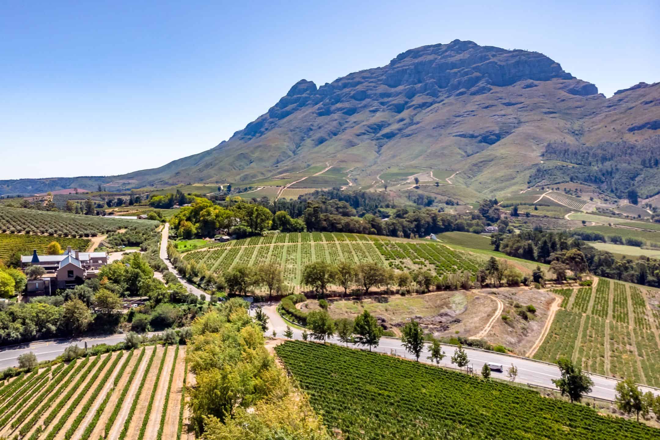 Stellenbosch travel scene with vineyards, mountains, and heritage town inspiration